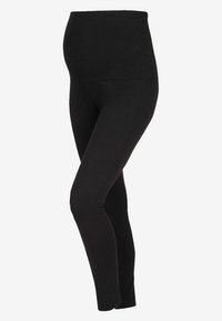 Fekete kismama leggings magas derékkal, rugalmas anyagból készült. Sima textúra, testhez simuló kialakítás, a pocak fölé nyúlik.