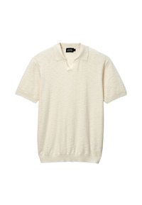 Polo shirt crème à manches courtes avec un col en V, présentant un tissu texturé et un ourlet côtelé pour un ajustement décontracté.