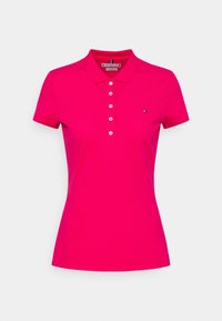 Fuchsia Poloshirt aus Baumwolle mit Kragen, fünftastigen Knopfverschluss und kleinem gesticktem Logo auf der linken Brust.