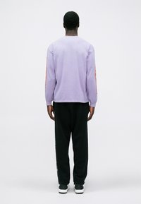 Aries WING DINGS UNISEX - Tops ar garām piedurknēm - purple