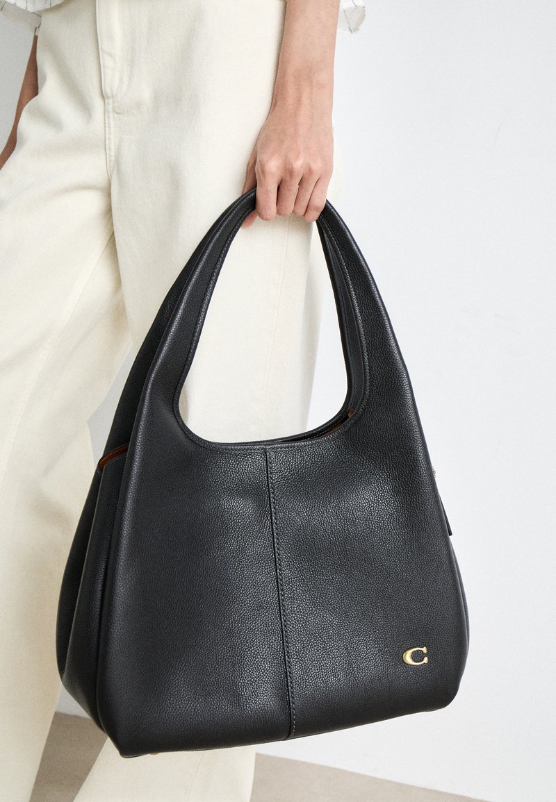 COACH POLISHED PEBBLE LANA SHOULDER BAG - Handbag - black - Zalando