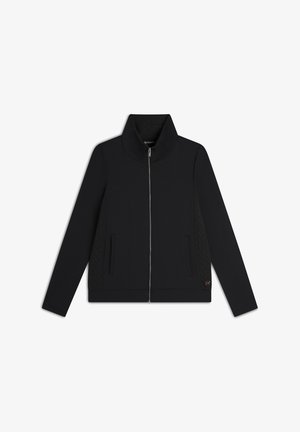 Giacca nera con zip, colletto alto, tasche laterali e dettagli testurizzati lungo i lati. Realizzata in tessuto morbido e flessibile.