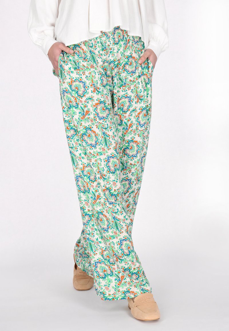 Wijdvallende broek van een lichtgewicht, ademende stof met een ingewikkeld bloemenpatroon in groen, oranje en blauw. Elastische tailleband met zakken.