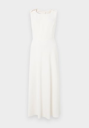 Biała sukienka bez rękawów z dopasowaną górą i rozkloszowanym dołem. Posiada zaokrąglony dekolt i delikatne akcenty na ramionach. Gładka faktura.