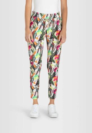Blommönstrade joggerbyxor med dragsko i midjan, med livliga färger som grön, rosa och orange, tillverkade av mjukt tyg.