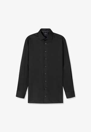 Zwarte langemouwenshirt gemaakt van gladde stof met een knoopsluiting aan de voorkant, puntige kraag en zwarte knopen. Tailored fit met omgeslagen mouwen.