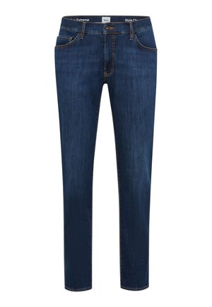 Dunkelblaue Jeans mit schmaler Passform, fünf Taschen und dezenten Steppdetails. Mit Reißverschluss und Knopfverschluss.