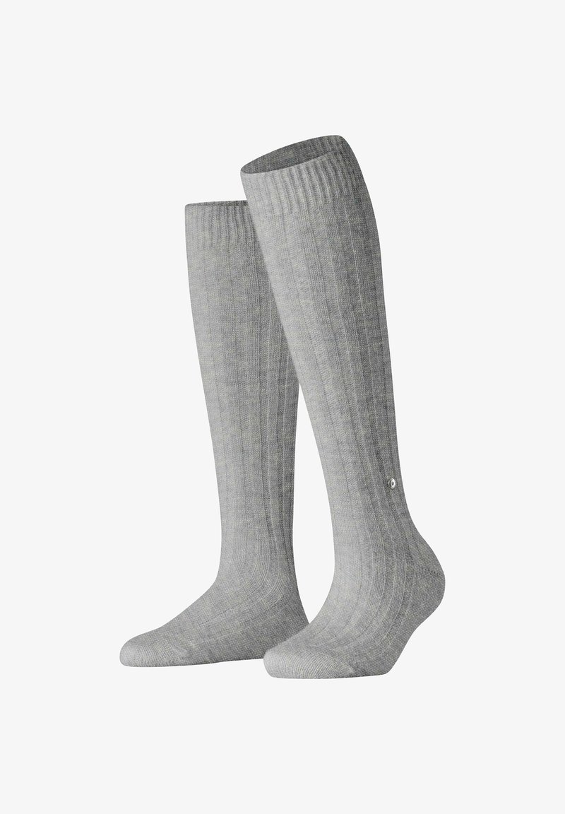 Calze grigie fino al ginocchio con una texture a coste. Realizzate in materiale morbido, presentano una piccola decorazione sul lato.