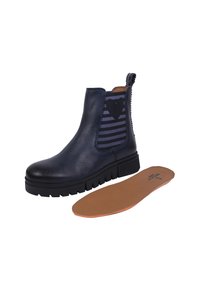 Dunkelblaue Leder-Stiefelette mit elastischen Seiteneinsätzen, gestreiftem Design und einer dicken schwarzen Gummisohle. Inklusive herausnehmbarer beige Innensohle.