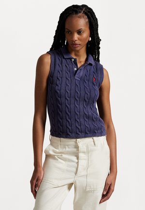 Polo-style sleeveless top in dark purple, featuring a cable-knit texture, two-button placket, and embroidered logo on the left chest.