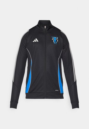 Juodas sportinis švarkas su mėlynomis detalėmis ir baltais dryžiais. Savybė yra aukštas apykaklė, užtrauktukų uždarymas ir logotipas ant krūtinės. Pagamintas iš lygaus audinio.