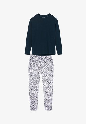 Granatowy top z długim rękawem, zestawiony z białymi spodnimi na sznurku z granatowo-beżowym wzorem kwiatowym.