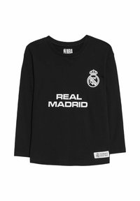 Svart långärmad t-shirt med rund halsringning. Har vit text "REAL MADRID" och en klubb logotyp tryckt på framsidan.