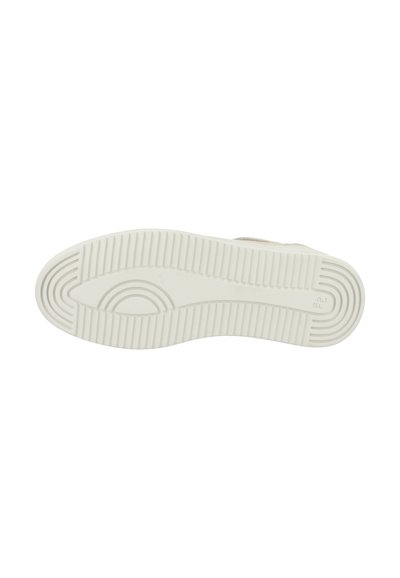 White rubber shoe sole with textured pattern and grooves. Features a circular accent design in the center. Smooth surface overall.