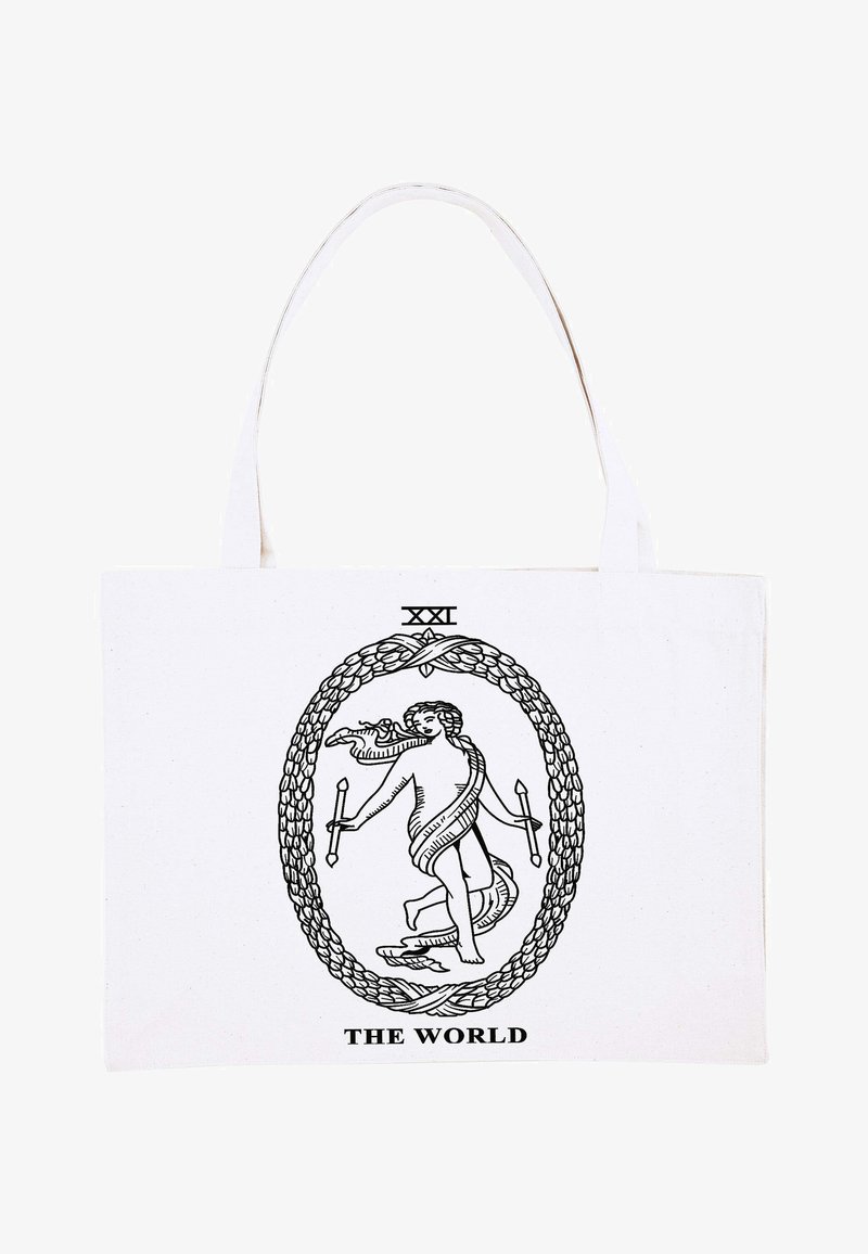 Witte canvas tas met een zwart graphic van een figuur in een cirkelvormige rand, met de tekst "XXI DE WERELD" eronder.