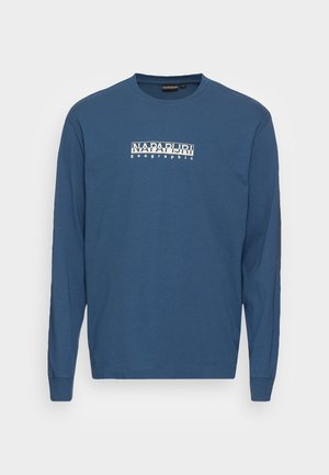 Sweat-shirt bleu à manches longues avec col rond, avec le logo "NAPAPIJRI geographic" imprimé en blanc sur la poitrine.