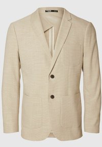 Beżowa marynarka slim-fit z teksturowanej tkaniny, z dwiema przednimi kieszeniami oraz jednorzędowym zapięciem z brązowymi guzikami.