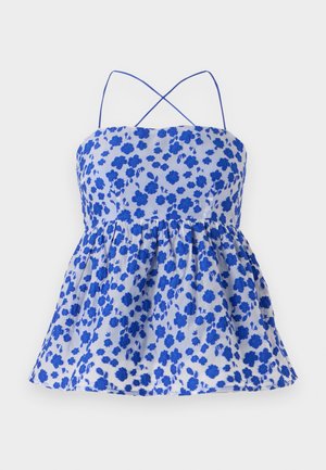 Blauwe top met bloemenprint, spaghetti bandjes, verzameld taille en uitlopende zoom. Gemaakt van lichtgewicht stof. Kenmerkt zich door kleine blauwe bloemen op een lichte achtergrond.