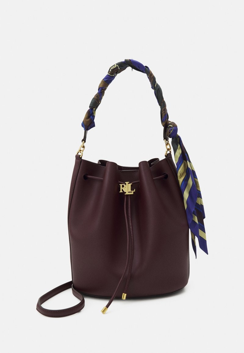 Mørkebrun læderbucket-taske med gyldent RLL-logo, snøre-lukning, snoet stofhåndtag i blå og grønne toner samt aftagelig skulderrem.