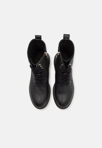 Tommy Hilfiger Bottines à plateau - black