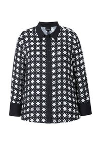 Camicia a pattern bianco e nero con collo, chiusura frontale a bottoni e maniche lunghe. Presenta un design geometrico a rombi con lettere.