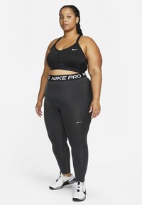 Nike Performance PLUS - Leggings - dk smoke grey/black/white