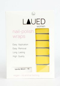 Gelbe Nagellack-Wraps in einer transparenten Verpackung, beschriftet mit "Vanilla Moon - 16," mit Anweisungen für eine einfache Anwendung und Entfernung.