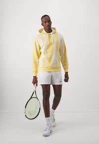 Nike Performance Mikina s kapucňou - topaz gold/coconut milk