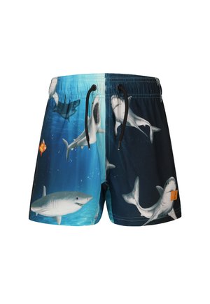 Lasten uimashortsit sinisellä vedenalaisella kuviolla, jossa on useita hait ja pieni oranssi kala, mustilla kiristysnauhoilla vyötäröllä.