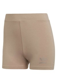 Shorts beiges en tissu doux, présentant une texture lisse, une taille élastique et un logo orné de strass sur le côté gauche.