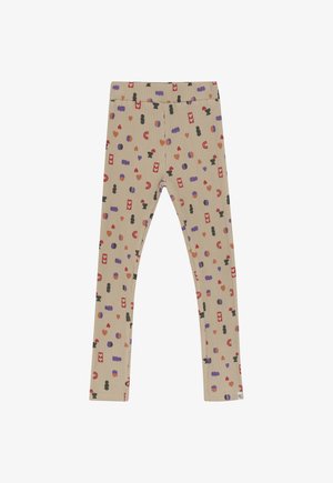 Beige geribde leggings met een patroon van rode, paarse, zwarte en oranje abstracte vormen en symbolen.