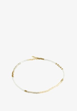 Beaded bracelet featuring white, cream, and gold beads. Includes a gold accent clasp and has a smooth texture with uniform shapes.