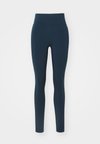 UNIVERSA SEAMLESS FRONT - Leggingek - armory navy
