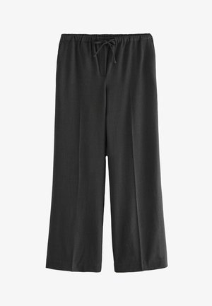 Melni, plati bikses, izgatavotas no viegla auduma, ar elastīgu jostasvietu un auklu, bez redzamām kabatām vai rakstiem.