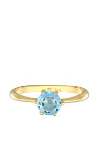 Goldplattierter Sterlingsilberring mit einem runden, facettierten hellblauen Edelstein, der sicher in einem sechszackigen Design eingefasst ist.