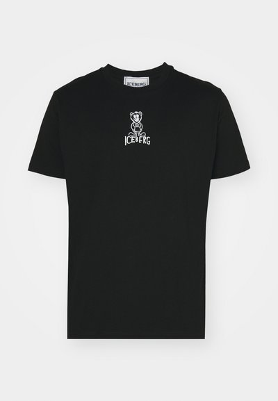 T-shirt en coton noir avec un graphique de ours brodé blanc et le texte "ICEBERG" en dessous. Encolure classique et manches courtes.