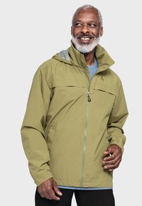 Olivgrüne Jacke mit Kapuze, durchgehendem Reißverschluss, elastischen Bündchen und grauem Innenfutter. Verfügt über eine Brusttasche mit Branding-Detail.