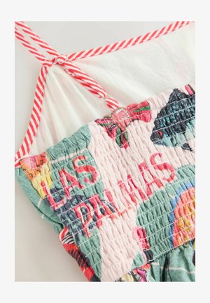 Bunt gemusterte Bluse mit smockiertem Design und rot-weiß gestreiften Trägern. Aus weichem Stoff mit leichter Textur.