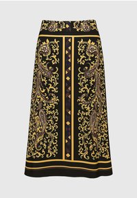 Jupe noire ornée d'un motif paisley élaboré en jaune et marron, entouré de formes géométriques, avec une texture de tissu lisse.