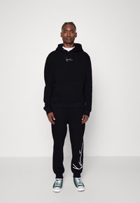 Karl Kani ESSENTIAL TRACKSUIT SET UNISEX - Tracksuit - black