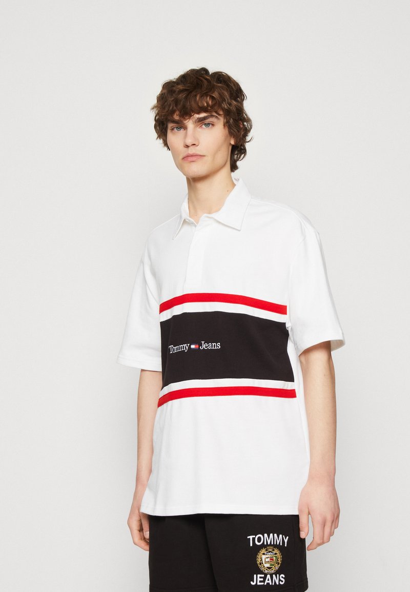 Tommy Jeans LINEAR RUGBY Polo shirt white Zalando.co.uk