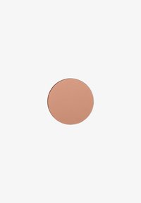 Fard à joues rond dans une nuance de marron pêche mat. Texture lisse sans paillettes, avec une surface plate et un bord net.