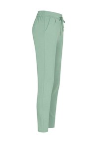 Pantalons de jogging vert clair en tissu doux. Comprend une taille élastique avec cordon de serrage, des poches latérales et un design à jambes fuselées.
