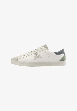 White leather sneakers with grey suede accents, round toe, perforated details on the sides, featuring a skull and crossbones logo.