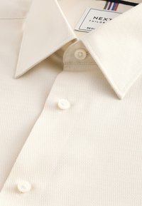 Unselected, ivory white