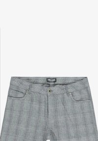 Grijze geblokte jeans met een knoopsluiting, riemlussen en meerdere zakken. De stof vertoont een getextureerd patroon met contrasterende lijnen.