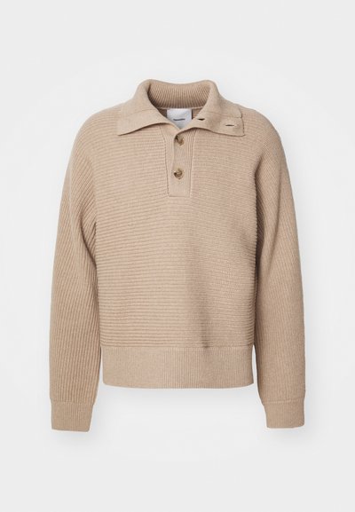 Beige knitted pullover with a collar, three buttons, and ribbed cuffs. Features a textured pattern and a cropped hem.