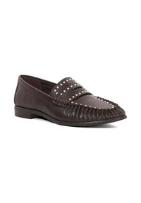 Brown leather loafer with studded accents, fringed design at the toe, low heel, and smooth texture on a flat sole.