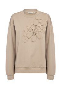 Felpa beige con collo rotondo e maniche lunghe. Presenta un'applicazione floreale testurizzata sul davanti, con polsini e orlo a coste.