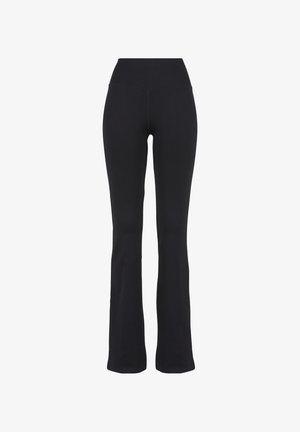 Pantaloni da yoga neri a vita alta, aderenti, con gambe a zampa, presentati su sfondo bianco.